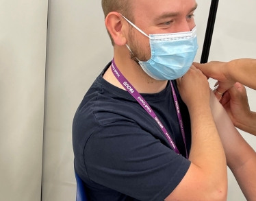 Cllr Adam Hicken receiving his vaccine